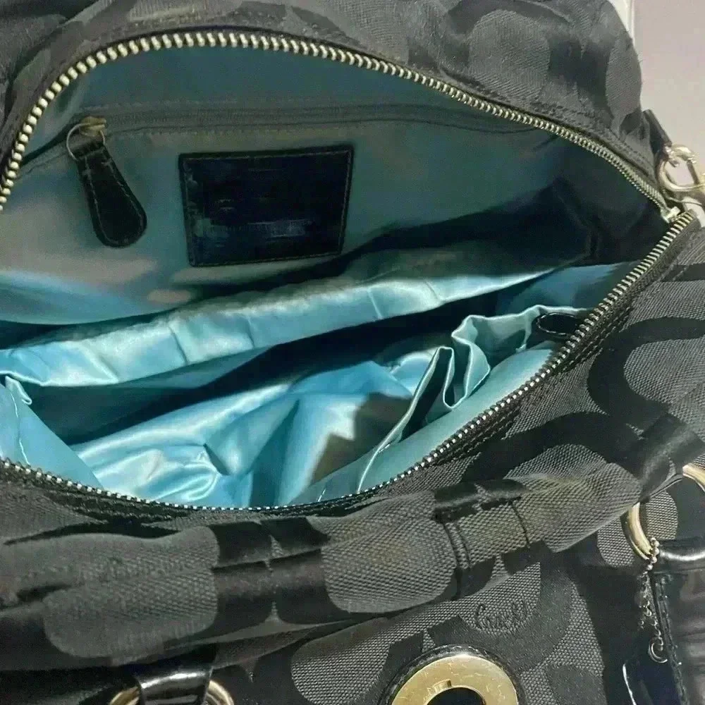 Coach cc signature